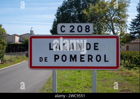 City road sign Lalande de Pomerol near Saint-Emilion wine making region, growing of Merlot or Cabernet Sauvignon red wine grapes, France, Bordeaux in Stock Photo