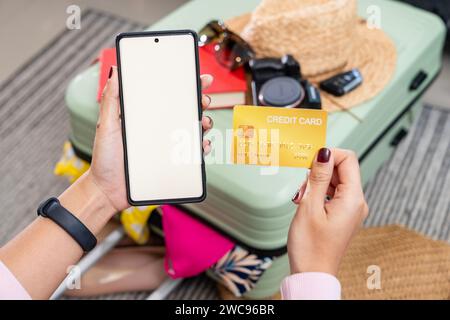 Preparing a credit card for travel Stock Photo