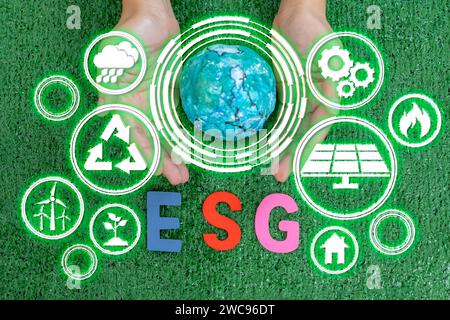 Model globe on hands, ESG icon for Environment Social and Governance ...