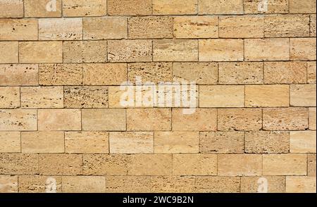 Shell Limestone Blocks Wall. Shell limestone wall texture background. Stock Photo