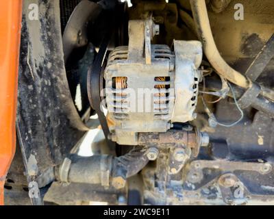 Alternator of a tractor closeup Stock Photo