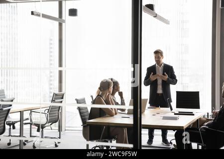 Successful millennial business team meeting in contemporary office Stock Photo