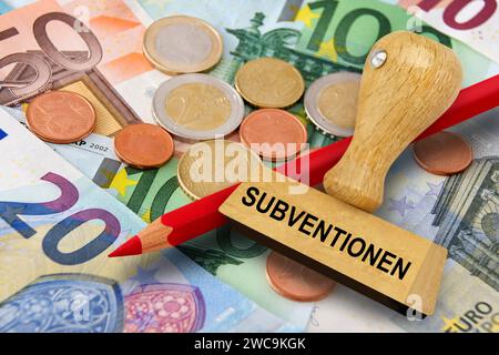 Deutscher Stempel mit Subventionen und Euro Geldscheine Stock Photo