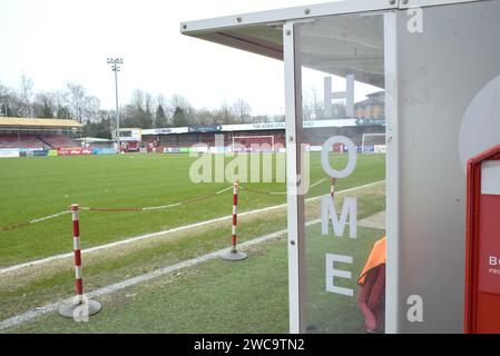 The stadium and home team dugoutbefore the Sky Bet EFL League Two match between Crawley Town and Salford City at the Broadfield Stadium  , Crawley , UK - 13th January 2024 Photo Simon Dack / Telephoto Images Editorial use only. No merchandising. For Football images FA and Premier League restrictions apply inc. no internet/mobile usage without FAPL license - for details contact Football Dataco Stock Photo