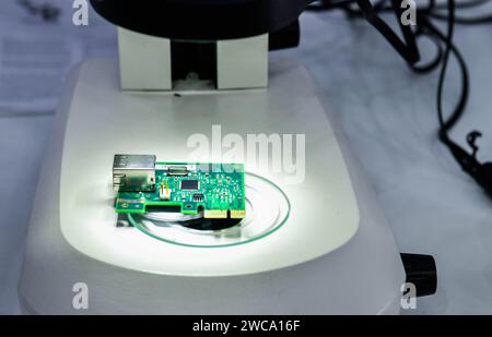 CMM machines for inspection high precision chip components on pcb board during working in industrial Stock Photo