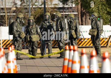 Tokyo, Japan. 15th Jan, 2024. Members of the Japan Self Defense Forces (JSDF) wearing protection gears take part in a civil protection exercise in Tokyo, Japan, on Jan. 15, 2023. (Credit Image: © POOL via ZUMA Press Wire) EDITORIAL USAGE ONLY! Not for Commercial USAGE! Credit: ZUMA Press, Inc./Alamy Live News Stock Photo