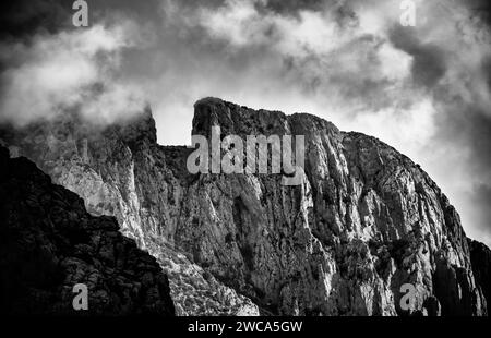 Puig Campana among the clouds Stock Photo