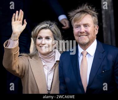 Amsterdam, Netherlands. 15th Jan, 2024. King Willem-Alexander and Queen Maxima arrive at the Royal Palace for the traditional New Year's reception. The royal couple will receive several hundred guests from politics and public administration and from various sectors of Dutch society. ANP KOEN VAN WEEL netherlands out - belgium out Credit: ANP/Alamy Live News Stock Photo