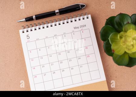 May 2024 desk calendar flat lay Stock Photo