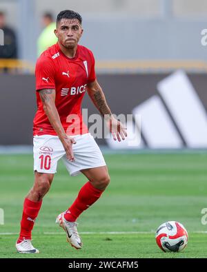 Lima, Peru. 14th Jan, 2024. Cesar Pinares of Universidad Catolica during the friendly match between Sporting Cristal and Universidad Catolica de Chile played at Nacional Stadium on January 14, 2024 in Lima, Peru. (Photo by Miguel Marrufo/PRESSINPHOTO) Credit: PRESSINPHOTO SPORTS AGENCY/Alamy Live News Stock Photo