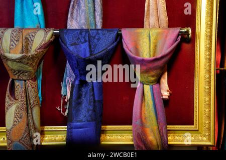 Various silk scarf fabrics at istanbul bazar showcasing the rich and colourful tapestry of Turkish culture and clothing Stock Photo
