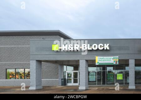 Rome, NY - Dec 17, 2023: H&R Block is an American tax preparation co. that operates in Canada, USA, and Australia, with over 12,000 locations worldwid Stock Photo