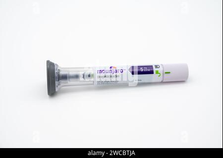 POTTERVILLE, MI - JANUARY 14, 2024: Mounjaro tirzepatide prescription injection pen isolate on a white background Stock Photo