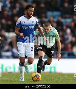 Timothee Dieng of Gillingham battles Ronan Darcy of Crawley Town. - Gillingham v Crawley Town, Sky Bet League Two, MEMS Priestfield Stadium, Kent, UK - 26th December 2023. Editorial Use Only - DataCo restrictions apply. Stock Photo