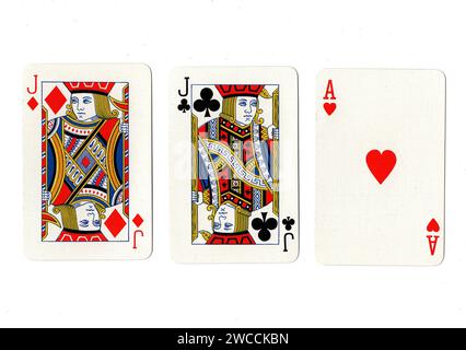 Vintage playing cards showing a pair of jacks and an ace isolated on a white background. Stock Photo