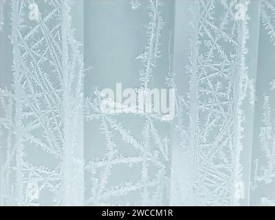 winter frosty background with snow patterns on ribbed texture Stock Photo