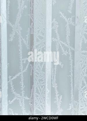 winter vertical frosty background with snow patterns on ribbed texture Stock Photo