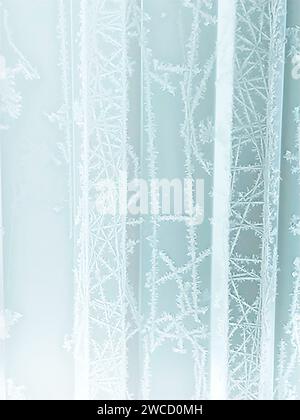 winter vertical frosty background with snow patterns and frost on white texture Stock Photo