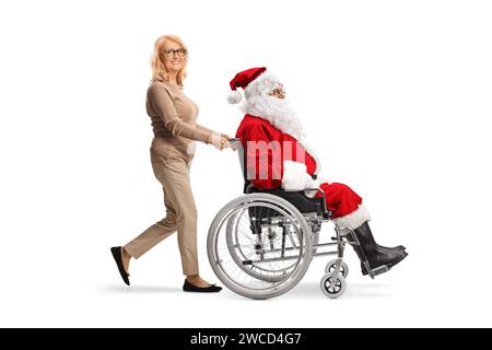 Middle aged woman pushing Santa claus in a wheelchair isolated on white background Stock Photo
