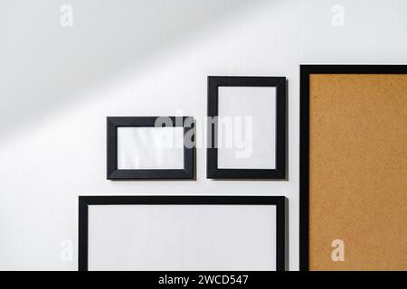 Set of black frames on white wall with copy space Stock Photo