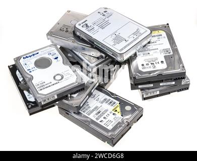 Old standard computer hard disk drives for disposal Stock Photo