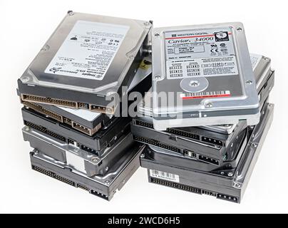Old standard computer hard disk drives for disposal Stock Photo