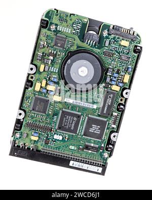 Old computer hard disk drive circuit board Stock Photo
