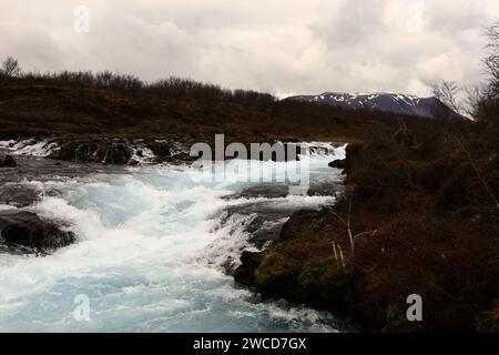 Brúará is a spring-fed river in West Iceland which runs by the boundaries of municipalities Biskupstungur and Grímsnes Stock Photo