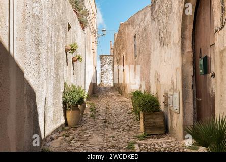 Narrow cobblestone street in the historical center of Erice, province of Trapani in Sicily, Italy Stock Photo