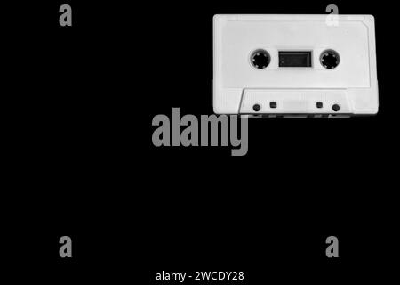 white cassette on black background with copy space Stock Photo