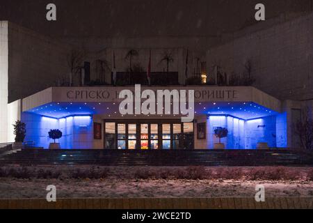 Novi Sad, Serbia. January - 15. 2024. Night view of modern building of the Serbian National Theater is located in the old center of Novi Sad on snowy Stock Photo