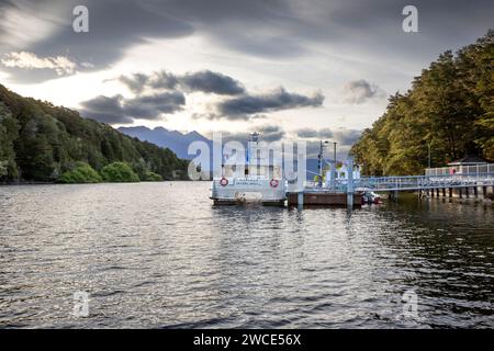 Passenger ferry Mararoa moored at Pearl Harbor on the Waiau River in Manapouri, Aotearoa (New Zealand), Te Waipounamu (South Island). Stock Photo