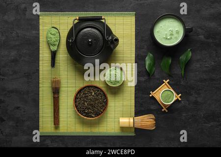 Composition with matcha tea and accessories on dark background Stock Photo