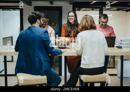 Late night collaboration in a creative office for business growth and profitability. Stock Photo