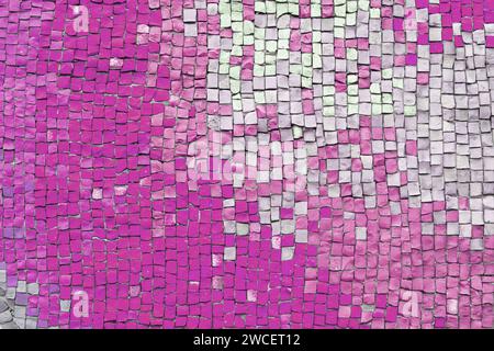 Abstract mosaic ceramic tile background. Chaotic pattern of pink and white ceramic tiles, wall decor, interior design element. Wallpaper, backdrop, co Stock Photo