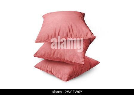 Stack of red pillows isolated on white background. Pile of  decorative cushions for sleeping and resting, home interior, house decor. Stock Photo