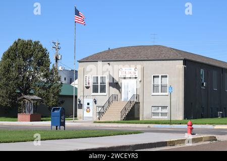 Akron Elks Lodge building with American Flag flying above in the wind - June 2023 Stock Photo