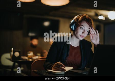 Confident businesswoman analyzing market data to drive business expansion and sustainability. Stock Photo