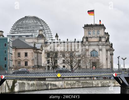 Berlin, Germany. 15th Jan, 2024. Vehicles run on a bridge in Berlin, Germany, on Jan. 15, 2024. Germany slipped into recession in 2023, the country's Federal Statistical Office (Destatis) said on Monday. Based on initial calculations, Destatis said that Germany's gross domestic product (GDP) fell by 0.3 percent year-on-year, with global crises weighing on the economy. Credit: Ren Pengfei/Xinhua/Alamy Live News Stock Photo