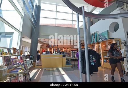 African American woman in the gift shop of the American Jazz Museum in the historic 18th and Vine District in Kansas City Missouri - May 2023 Stock Photo