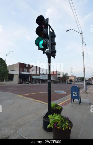 Vintage traffic light (green light) in downtown McCook Nebraska - May 2023 Stock Photo