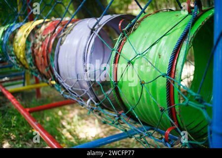 Close up of colorful barrels in the playground Stock Photo