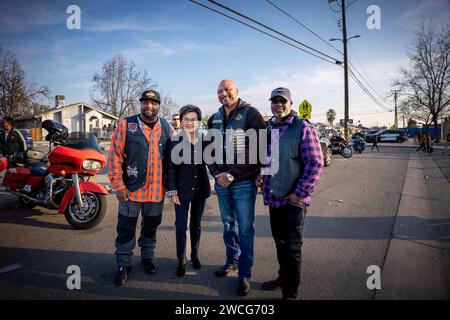 Bakersfield, California, USA. 15th Jan, 2024. Mayor Karen Goh poses for a photo with the ''˜Sons of Solomon' Masonic Motorcycle Club during MLK Day festivities in Bakersfield, California, on January 15, 2024. (Credit Image: © Jake Lee Green/ZUMA Press Wire) EDITORIAL USAGE ONLY! Not for Commercial USAGE! Stock Photo