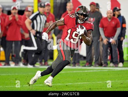 Tampa, United States. 15th Jan, 2024. Tampa Bay Buccaneers wide receiver David Moore (19) runs for the end zone to score against the Philadelphia Eagles during the first half of a wild card playoff game at Raymond James Stadium in Tampa, Florida on Monday, January 15, 2024. Photo by Steve Nesius/UPI Credit: UPI/Alamy Live News Stock Photo