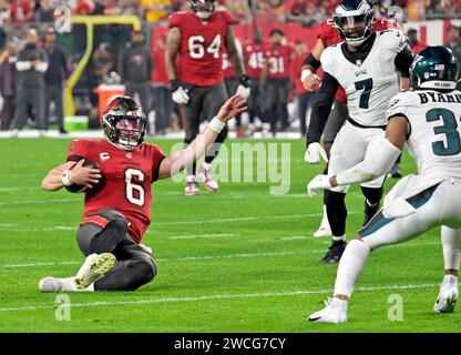 Tampa, United States. 15th Jan, 2024. Tampa Bay Buccaneers quarterback Baker Mayfield (6) slides for a first down against the Philadelphia Eagles during the first half of a wild card playoff game at Raymond James Stadium in Tampa, Florida on Monday, January 15, 2024. Photo by Steve Nesius/UPI Credit: UPI/Alamy Live News Stock Photo