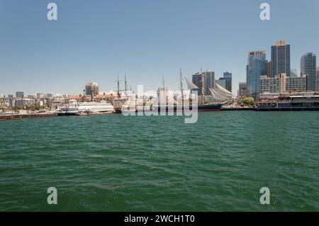 San Diego, California, USA – August 17, 2023. Downtown San Diego city skyline and Maritime Museum with historic ships seen from the ocean Stock Photo