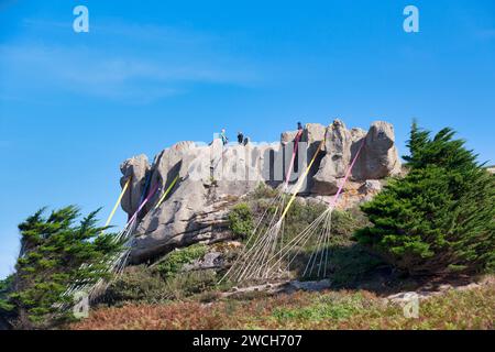 Trégastel, France - September 21 2021: King Gradlon is a granite chaos along the coast that attracts many tourists. Stock Photo
