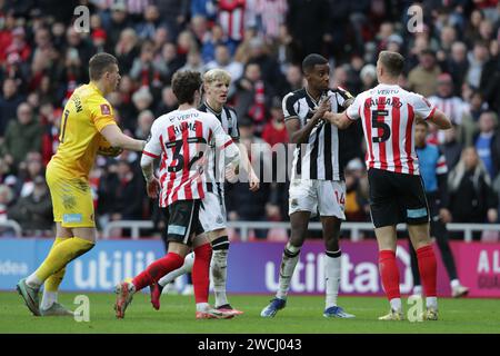 Alexander Isak of Newcastle has an altercation with Daniel Ballard of ...