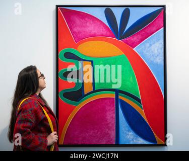 London, UK. 16th Jan, 2024. A staff member with 'Spring', 2014, by Mark Gorky at the Long & Ryle stand at the preview of London Art Fair at the Business Design Centre in Islington. Works by artists represented by 120 modern and contemporary galleries from around the world are on show 17 to 21 January. Credit: Stephen Chung/Alamy Live News Stock Photo