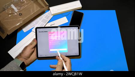 Strasbourg, France - Nov 16, 2017: Personal perspective Apple Music get three months of free music message on latest iPad Pro Stock Photo